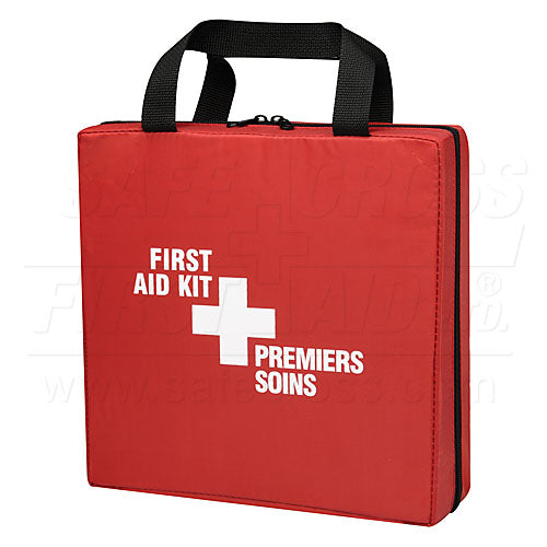 A red first aid kit with a white cross and the text 'FIRST AID KIT' and 'PREMIERS SOINS' on the front.