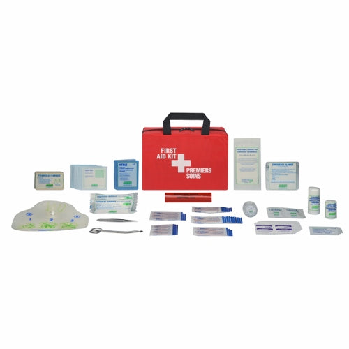 A red nylon first aid kit with various medical supplies displayed in front of it, including bandages, antiseptic wipes, and a CPR face shield.
